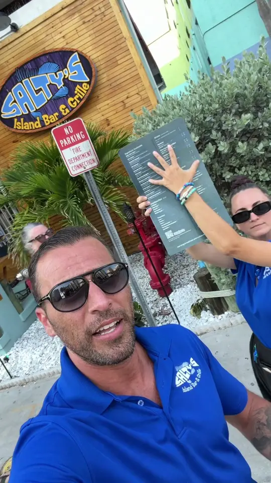 Salty's Island Bar & Grille in Clearwater Beach showing review, visit, fresh crab, cold drinks, piña coladas, video by prestonatthebeach on TikTok