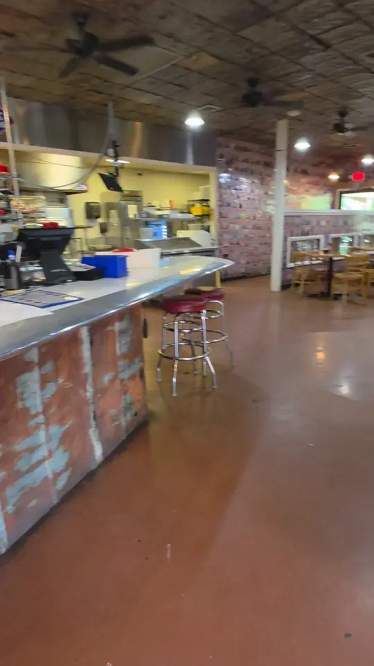 Sam's Burger Deli in Rome showing review, burger, fried squash, video by Discover Our World on Facebook