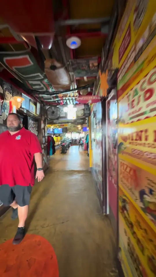 Sandbar Sports Grill in Cocoa Beach showing food, 1-lb wings, drink, draft pitcher, drink, high noons, drink, fireball shots, video by cuckooforcocoabeach on TikTok