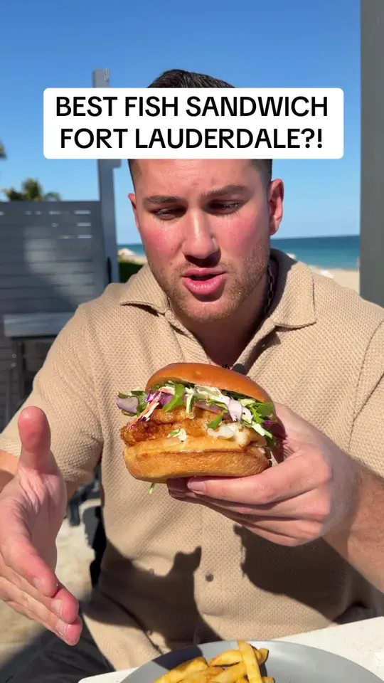 Sandbar Sports Grill in Miami showing food, fish sandwich, video by mikeiseating on TikTok