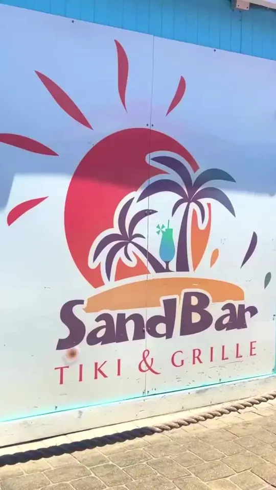 SandBar Tiki & Grille in Englewood showing visit, review, food, brisket tacos, drinks, atmosphere, video by nudionthebeach on TikTok