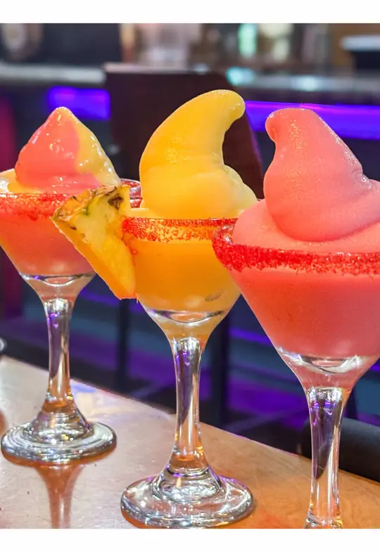 Sapo's Mexican Cocina & Bar in Columbus showing drink, soft serve margarita, flavor, pineapple watermelon mix, video by columbusgeorgiaeats on TikTok