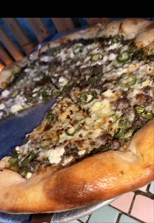 Satchel's Pizza in Gainesville showing review, pizza, pesto pizza, video by samantha_angelie on TikTok