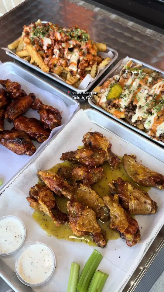 Sauce Wing Co in Duluth showing food, wings, video by charmed.eats on TikTok