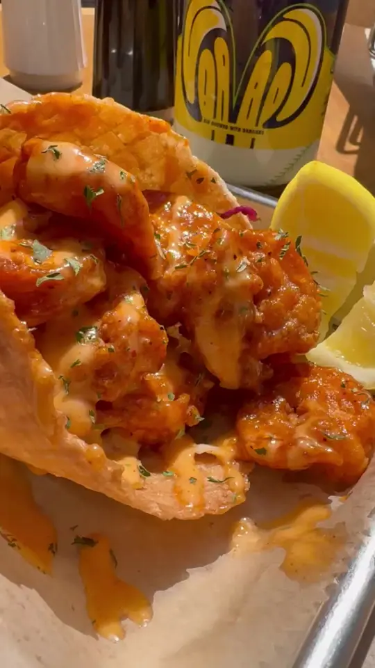 Savannah Seafood Shack in Savannah showing shrimp, sweet waffle cone with slaw fried seafood, shack sauce, crab pie, video by savannahseafoodshack on TikTok