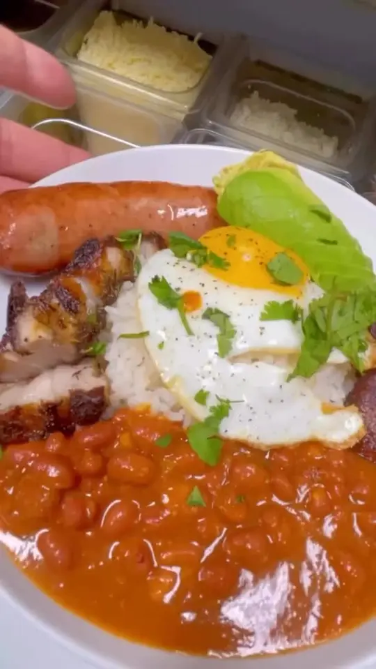 Savor 100x35 in North Port showing food, paisa bowl, video by Savor 100x35 on Facebook