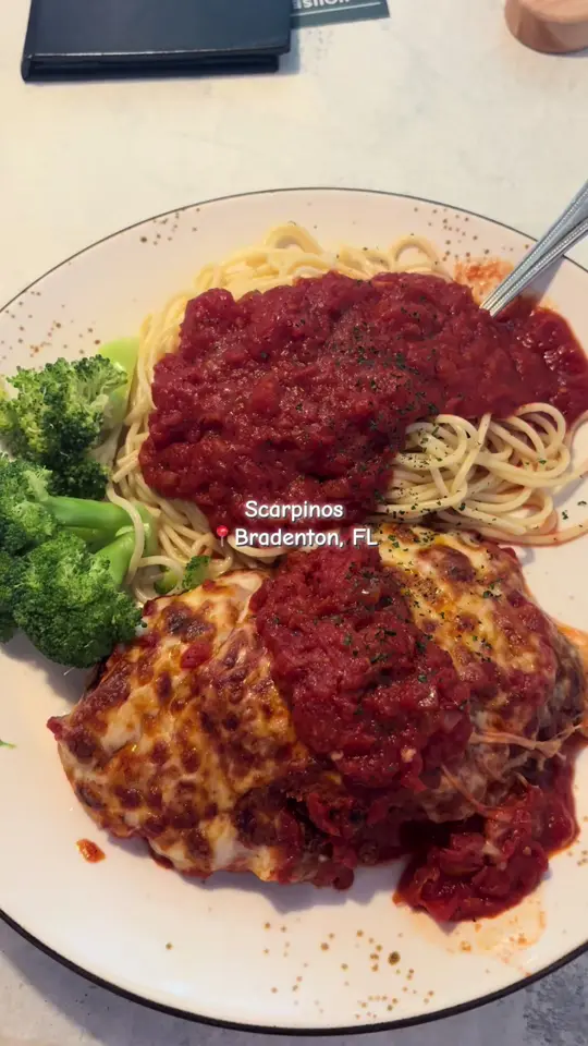 Scarpino's Classic Italian in Bradenton showing restaurant, chicken parm, video by popsaguado on TikTok
