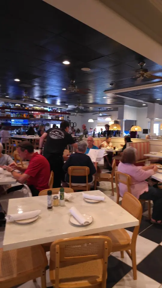 Scarpino's Classic Italian in Lutz showing restaurant, interior, food, cacio e pepe, video by Scarpino's Classic Italian on Facebook