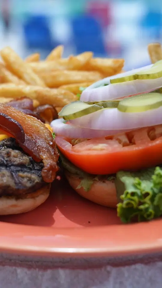 Schooners in Panama City showing food, burgers, drinks, beer, video by Beach TV - Panama City Beach, FL on Facebook