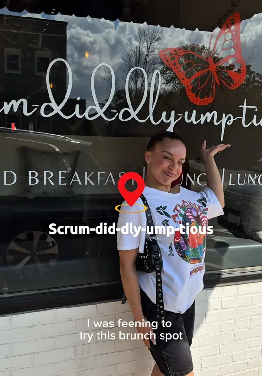 Scrum-did-dly-ump-tious in Lawrenceville showing review, shrimp & lump crab dip, jerk chicken egg rolls, collard greens, chicken & carrot cake waffle, biscuits + cornbread, five-cheese baked macaroni, shrimp, video by itsjazescobar on TikTok