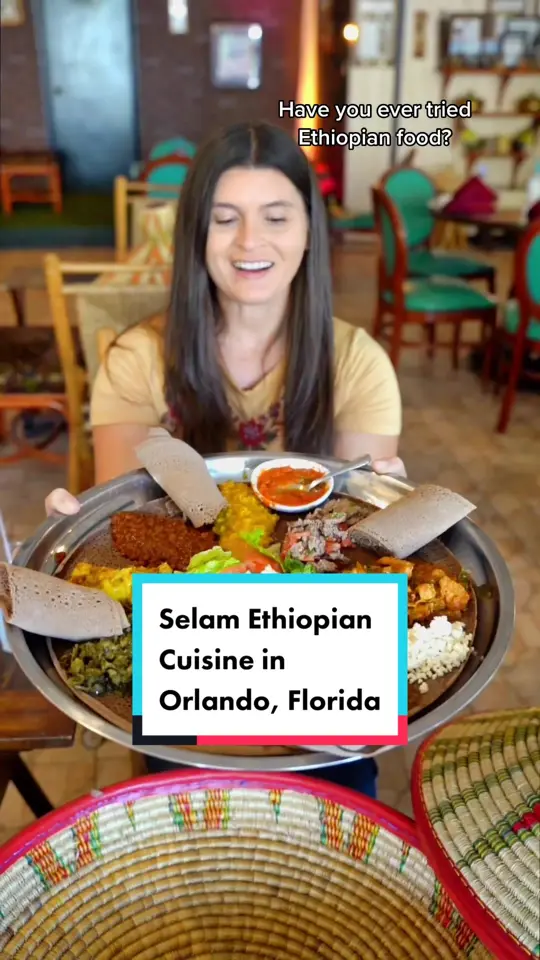 Selam Ethiopian & Eritrean Cuisine in Orlando showing review, visit, food, spiced stews, combination platter, traditional coffee ceremony, video by visit_orlando on TikTok