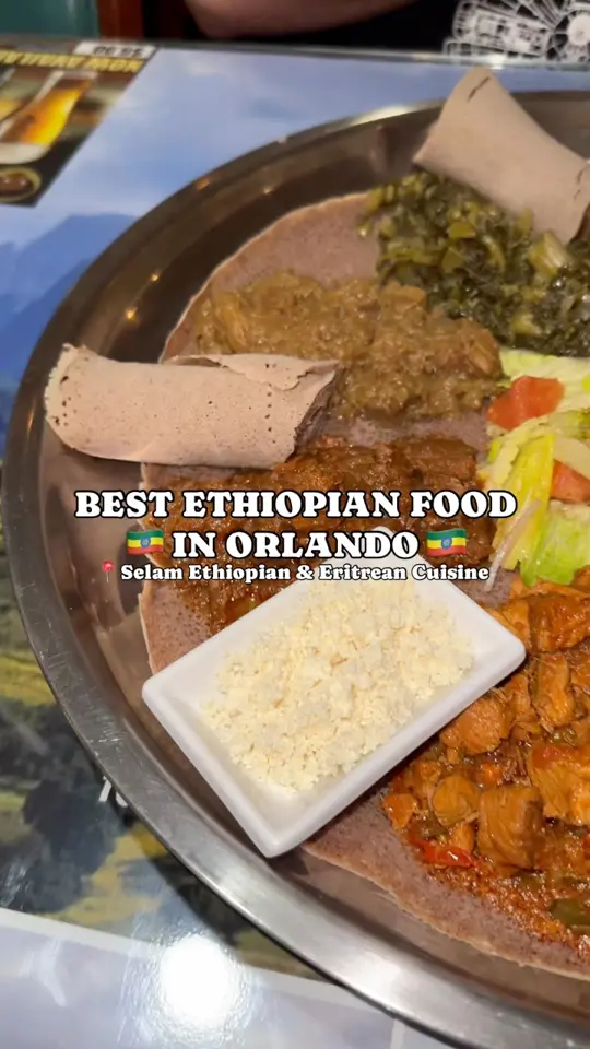 Selam Ethiopian & Eritrean Cuisine in Orlando showing review, injera, meat and veggie combination platter, video by Beercutieandfoodie on Facebook