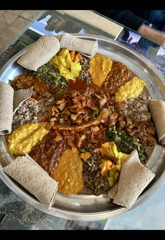 Selam Ethiopian & Eritrean Cuisine in Orlando showing review, visit, food, lunch, selam veggies special, lamb tibs, video by week.end.cook on TikTok