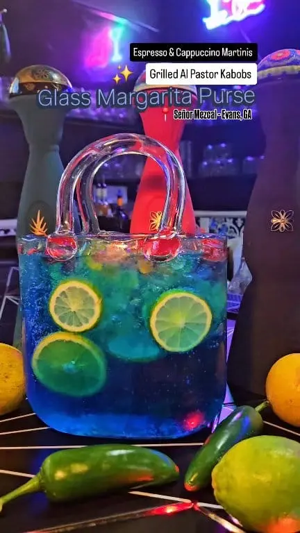 Señor Mezcal Mexican Kitchen & Cantina in Evans showing cocktail, margarita purse / cocktail, jolly rancher margarita / drink, espresso martini / drink, cappuccino martini, video by Dating CSRA on Facebook