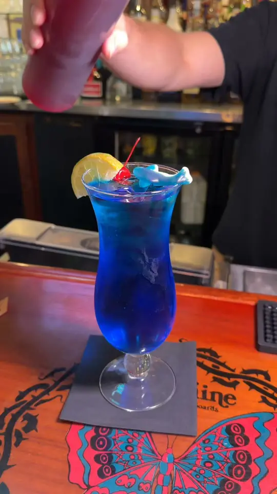 Shark Pit Bar & Grill in Cocoa Beach showing cocktail, video by Shark Pit Bar & Grill on Facebook