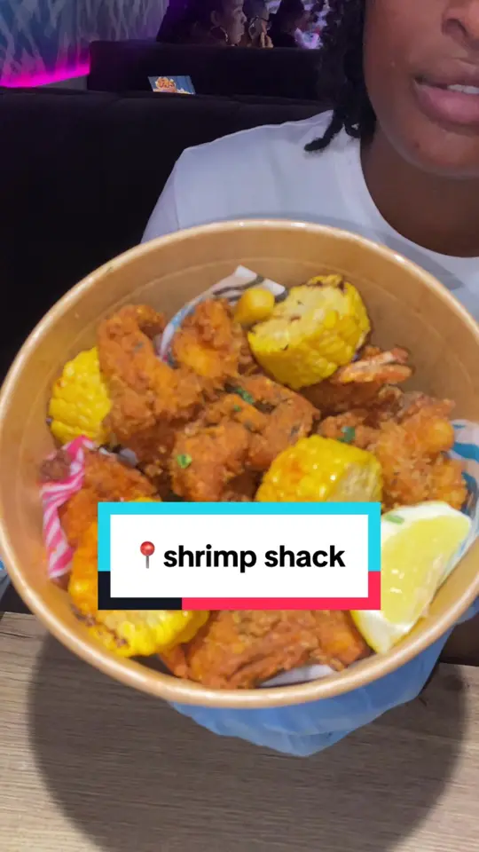 Shrimp Shack in Jacksonville Beach showing review, steak and shrimp meal, snow crab seafood boil, shack sharer bucket, lobster seafood boil, rice, chips, video by propperbitofkit on TikTok
