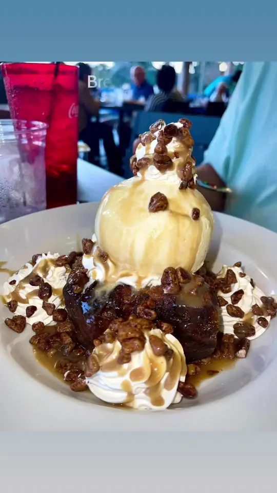 Ski Beach Bar and Grill in Leesburg showing bread pudding, candied pecans, vanilla ice cream, video by crochetnurse22 on TikTok