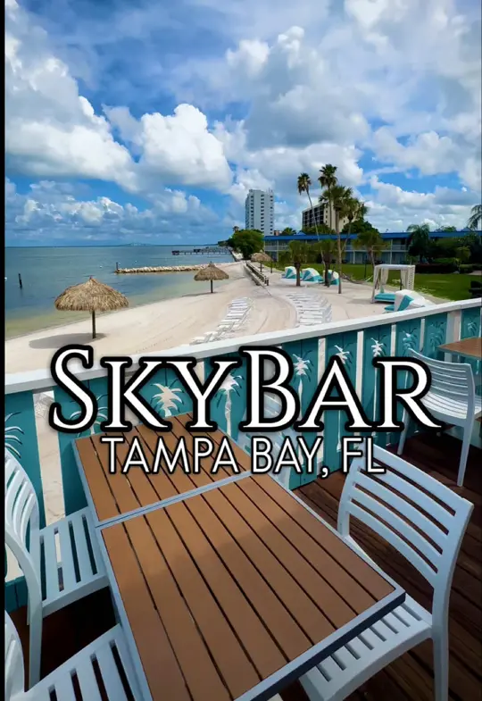 SkyBar + Grille in St. Petersburg showing visit, atmosphere, waterfront views, frozen cocktails, beach bites, video by thingstodotampabay on TikTok