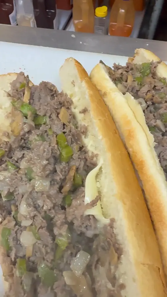 Slice Of The Burg in St. Petersburg showing cheesesteaks, pizza, monday madness special, video by Slice of The Burg on Facebook