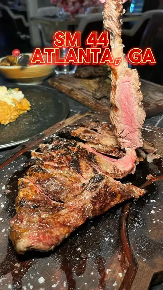 SM44 Atl in Atlanta showing restaurant, grand opening, appetizers, fried mushrooms, brussel sprouts, seafood fondue, entrees, ribeye steak, jerk lamb chops, drink, lychee mart, video by Candace Eloise on Facebook