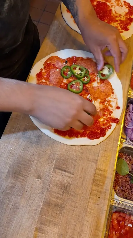 Smokin' Oak Wood-Fired Pizza and Taproom in Brooksville showing pizza, kids eat free offer, bee keeper cocktail, family dining, summer promotion, video by Smokin' Oak Wood-Fired Pizza & Taproom - on Facebook