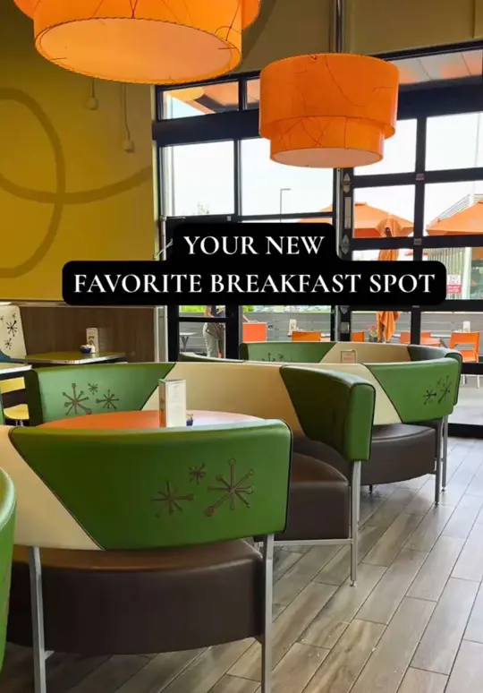 Snooze, an A.M. Eatery in Buford showing visit, review, atmosphere, food, pancake flight, video by acaponeconnection on TikTok