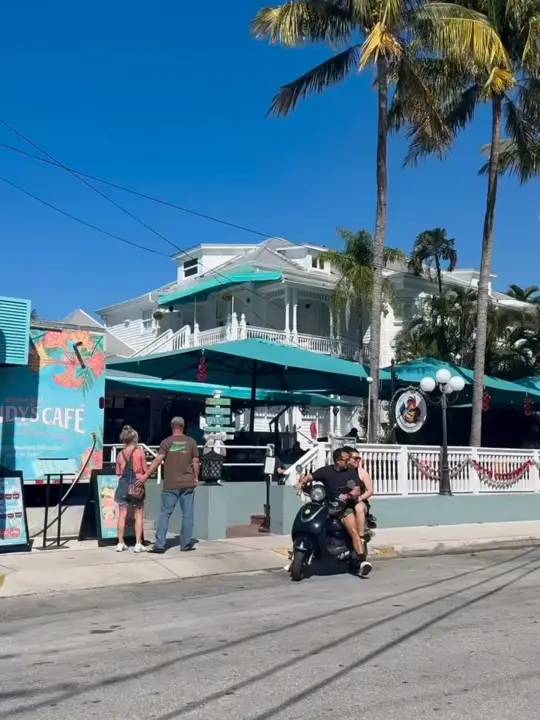Southernmost Sandy’s Cafe in Key West showing visit, atmosphere, video by Sandy’s Cafe at the Southernmost Point on Facebook