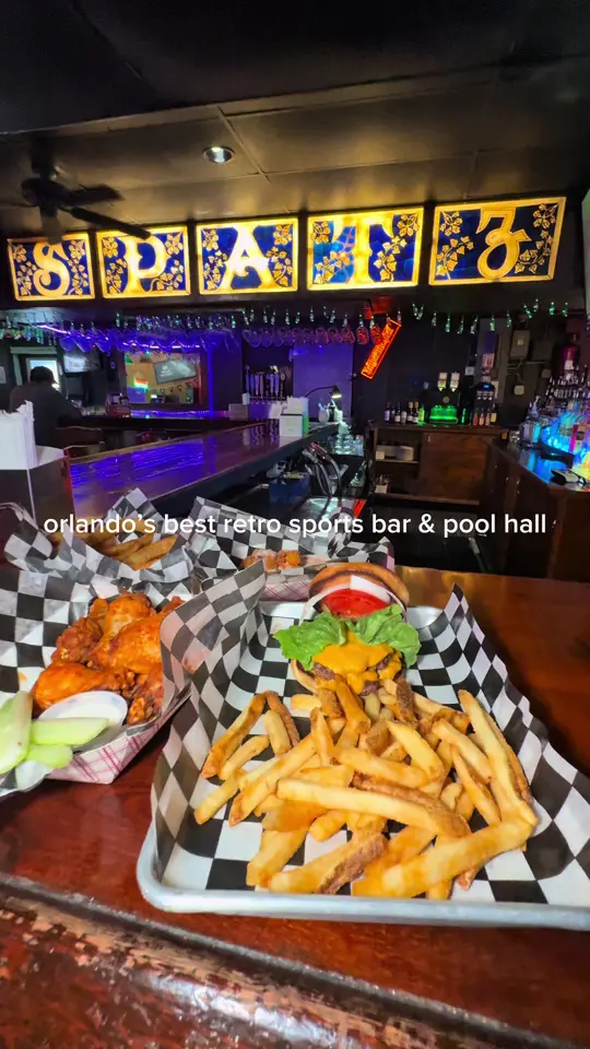  in Florida showing retro sports bar, billiard pool hall, darts games, retro arcade games, smashburgers, crispy wings, video by tastychomps on TikTok