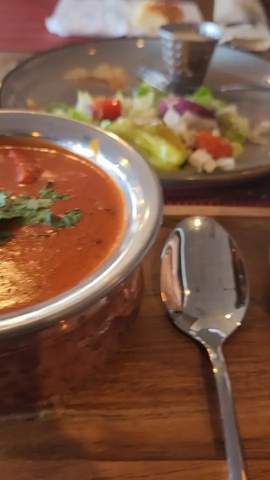 Spice Odyssey Grill in Hiram showing review, authentic indian food, friendly service, red velvet cheesecake cake combo, garlic nann bread, video by Mario DeBlak Robinson on Facebook