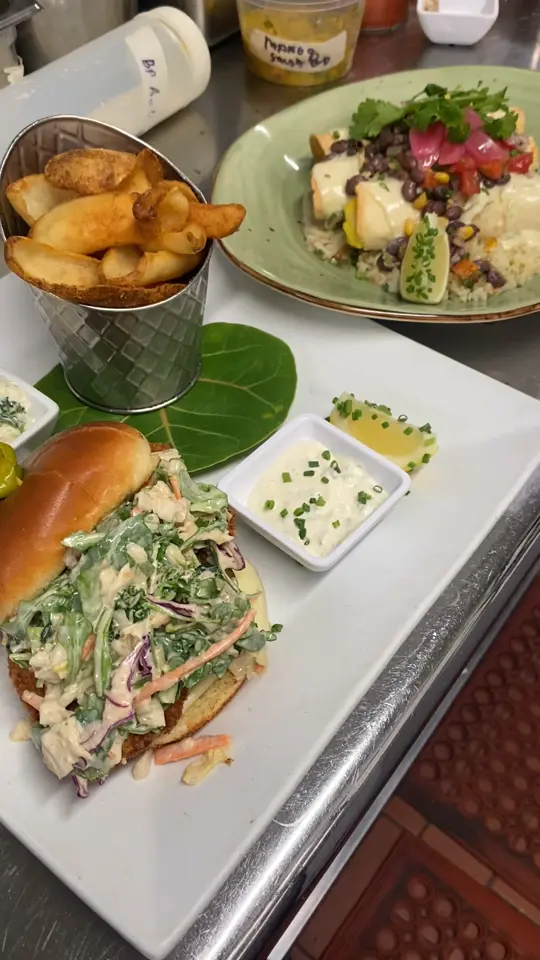 Square Grouper Bar and Grill in Cudjoe Key showing food, pulled pork breakfast enchiladas, drink, bloody mary, video by Square Grouper Bar and Grill on Facebook