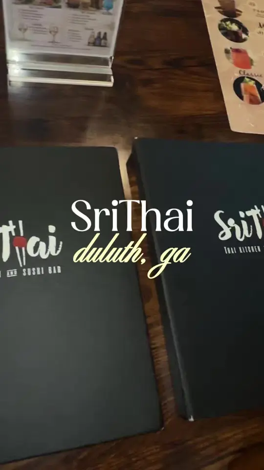 SriThai: Thai Kitchen and Sushi Bar (Duluth) in Duluth showing review, thai sampler, fried calamari, chicken satay, gyoza dumplings, spring rolls, pad si ew with pork, spicy basil noodles with pork, video by val4hunnid on TikTok