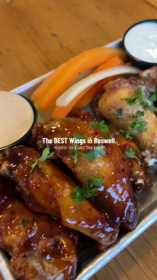 Standard at Roswell in Roswell showing wings, garlic parmesan wings, thai wings, video by madoleapproved on TikTok