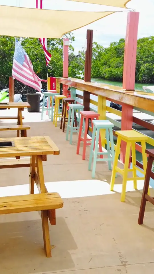 Stock Rock Cafe in Stock Island showing review, great food, incredible views, video by Sunset Watersports on Facebook