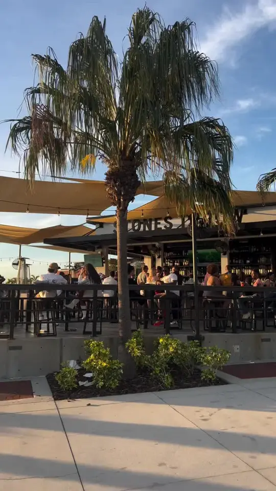 Stones Throw in Tampa showing casual dining, waterfront atmosphere, sunset view, tacos, seafood, drinks, video by caitlynngoff on TikTok