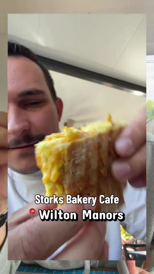 Stork's Bakery & Cafe in Wilton Manors showing review, pumpkin bread, thumbprint cookies, focaccia, bacon egg & cheese, video by chubbyboyrolls on TikTok