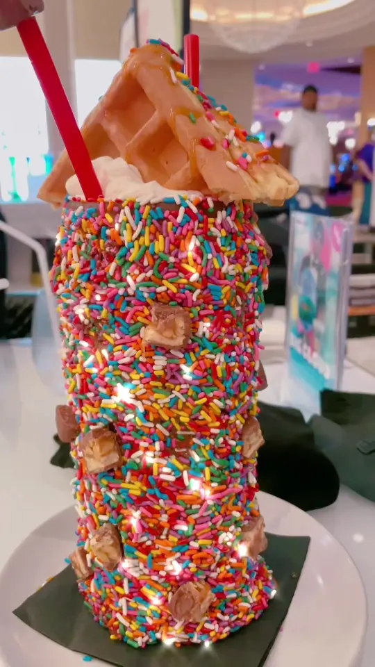 Sugar Factory - Tampa Bay in Tampa showing rainbow sliders, sprinkles, video by weekendsintampa on TikTok