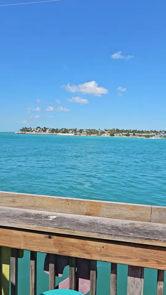 Sunset Pier in Key West showing cold beer, great food, music, ocean view, video by Florida Keys Resorts on Facebook