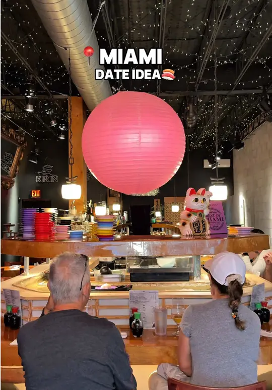  in Florida showing sushi, kaiten bar, menu items, sake, wine, video by gabrielaromeros on TikTok