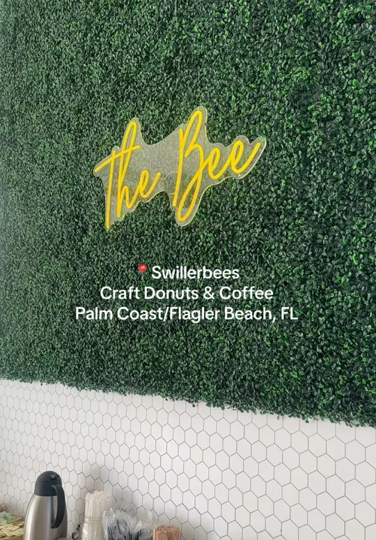 Swillerbees Craft Donuts & Coffee in Flagler Beach in Flagler Beach showing review, visit, coffee, white raspberry coffee, donuts, video by jesus_journals on TikTok