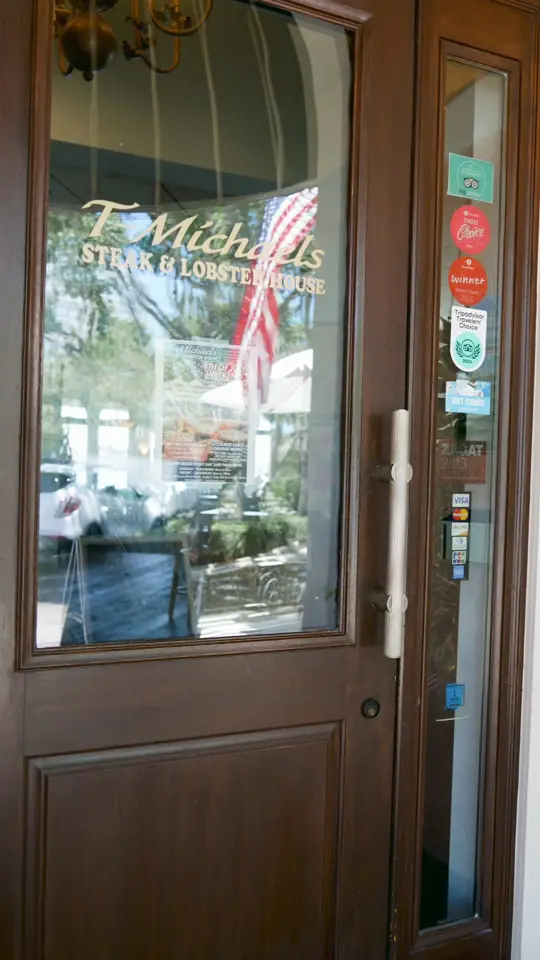 T-Michaels Steak & Lobster in Naples showing review, visit, steak, lobster, waterfront views, video by The Village Shops on Venetian Bay on Facebook