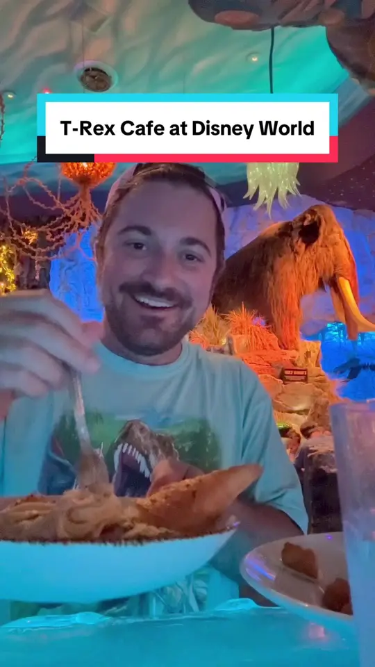 T-Rex Cafe in Lake Buena Vista showing food review, shark bar, prehistoric pasta, video by theshayspence on TikTok