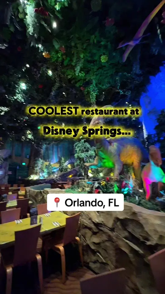 T-Rex Cafe in Lake Buena Vista showing visit, atmosphere, video by ortiztraveladventures on TikTok