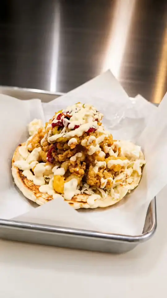 Taco Dive in Palm Beach Gardens showing food, fried calamari, video by Taco Dive St. Lucie West on Facebook