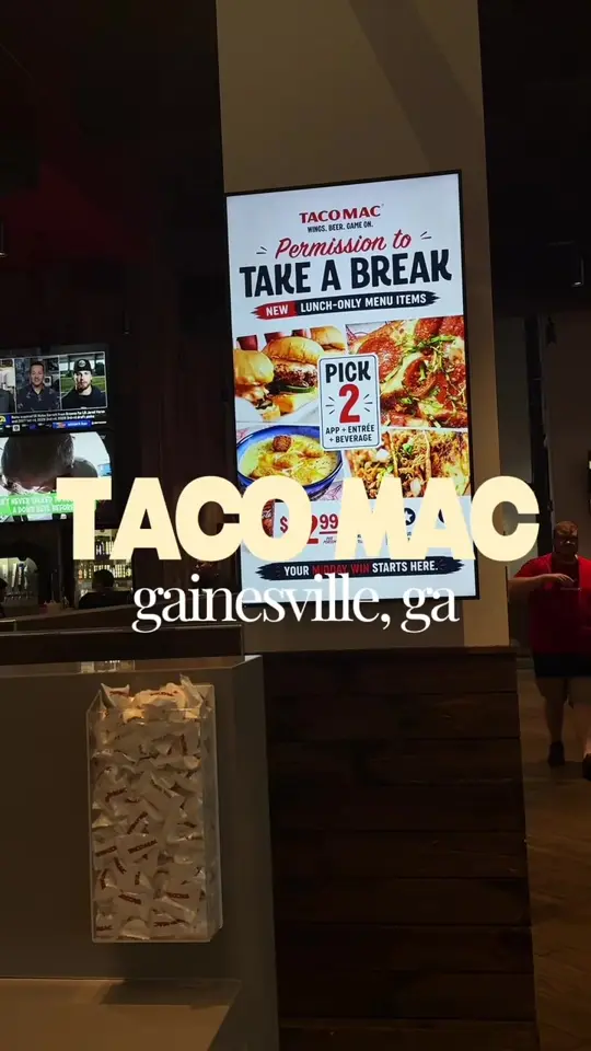 Taco Mac Gainesville in Gainesville showing review, smoked brisket taco, crispy chicken taco, cajun voodoo magic wings, sweet chili sesame wings, video by val4hunnid on TikTok