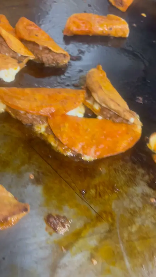 Taco Rock in Pensacola showing food, cheesy birria tacos, video by Taco Rock 29 on Facebook