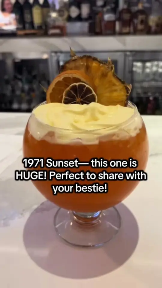Tambu Lounge in Lake Buena Vista showing cocktail, disney monorail bar crawl, venue visit, tambu lounge, video by Madyson Travels on Facebook