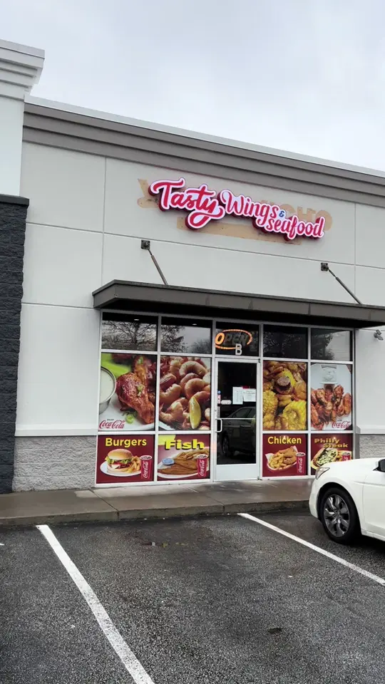TASTY WINGS & SEAFOOD in Thomson showing review, chicken wings, fries, video by firethiefreviews on TikTok