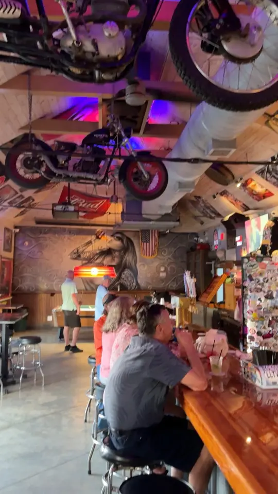 Tattoos and Scars Saloon in Key West showing happy hour, drinks, atmosphere, video by Backyards of Key West Gallery on Facebook