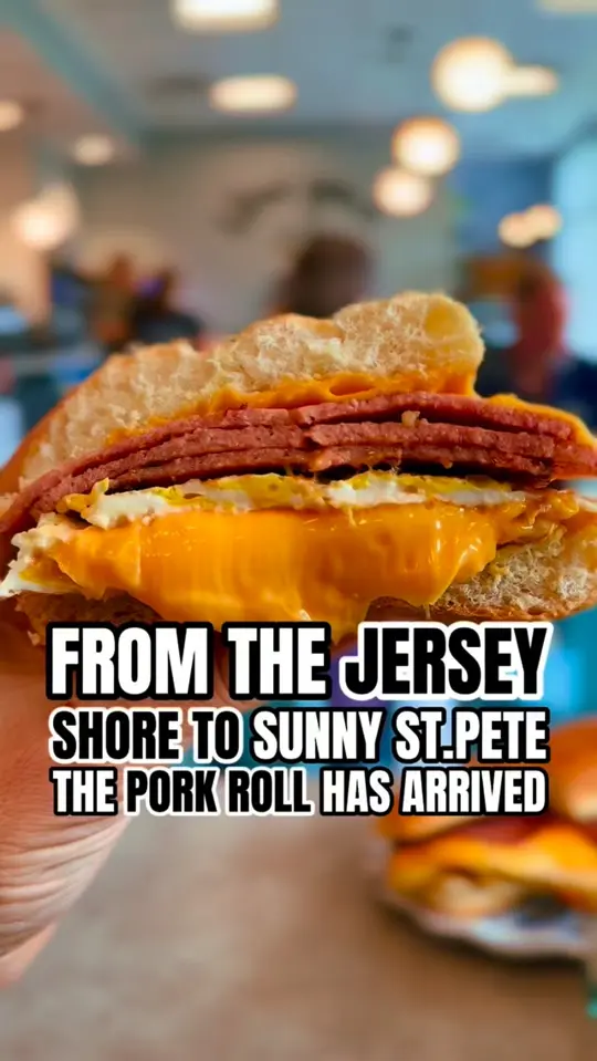Taylor Sam's in St. Petersburg showing brunch, pork roll burger, latte with crumb cake crumbs, beverage special, restaurant visit, video by St. Pete is Awesome on Facebook