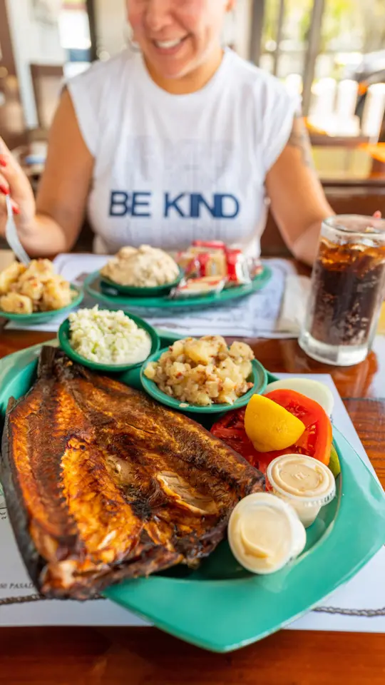 Ted Peters Famous Smoked Fish in St. Petersburg showing review, smoked mullet, amberjack, salmon, fish spread, german potato salad, burgers, root beer, video by Visit St. Pete-Clearwater on Facebook